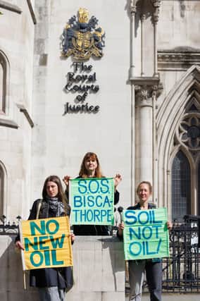 Protestors outside the High Court. © Crispin Hughes