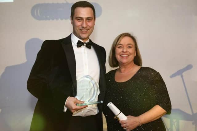 Mandy Jackson (right), CEO of Tanglewood Care Services Ltd, presenting Lee Rochford, Business Manager at The Old Hall Care Home in Billingborough, with his award at The Lincolnshire Care Awards 2023.