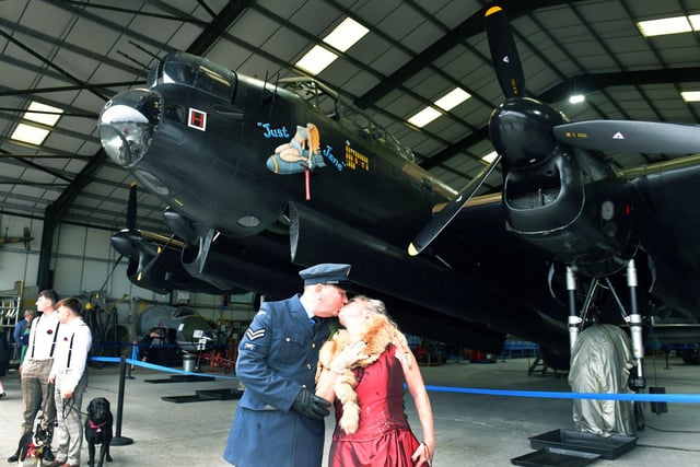 Sealed with a kiss. Carl and Sharol Vasse in front of the Just Jane Lancaster.