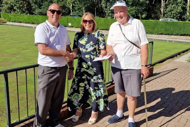 Amber Care Open Bowls Tournament runners-up (left) Neil Hands and Tony Sandilance, with Amber Care MD Bronia Johnson.