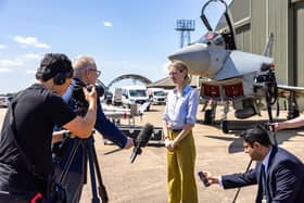 Armed Forces Minister Louise Sandher-Jones MP visited RAF Coningsby on July 2 to discuss the nation's air power, view RAF Typhoon capability and meet serving personnel at the Lincolnshire base. She is pictured meeting the press in front of a Typhoon, StormShroud and Lanner drone. Photo: Cpl James Skerrett RAF/MOD