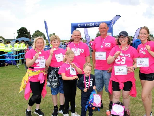 Team Graves at the Race for Life, from left: Nikki Riley, James Riley, 12, Jessica Riley, 8, Daniel Riley, Paul Graves, Charlie Graves, 4, Charlotte Graves, and Shannon Graves.