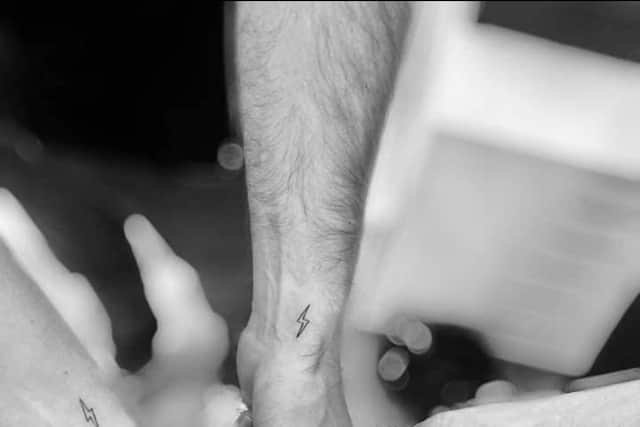 Michelle and Lisa have joined with family members to get matching lightening tattoos to symbolise strength.