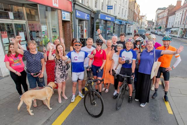 The cyclists with their supporters back in Louth. Photos: John Aron Photography