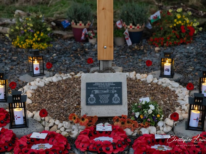 Seven lanterns were lit, one for each member of the crew lost in 1942.