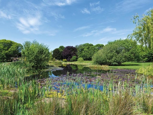 The grounds include two ponds and a lake.