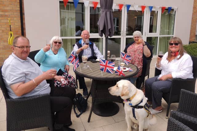 Enjoying the jubilee party at Holdingham Grange, from left - Pete, Barbara, Paul, Tracey, Jacqui and guide dog Vinnie.