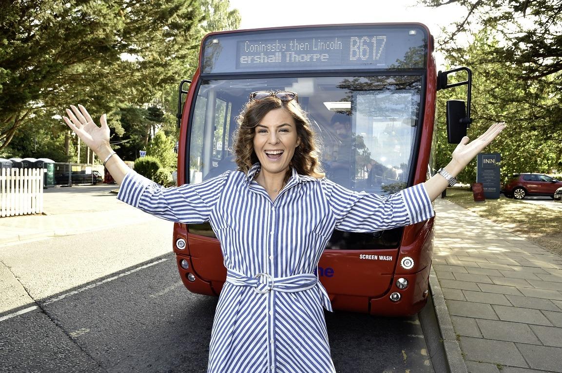 Coun Natalie Oliver and the B617 bus in Woodhall Spa. Photo: LCC