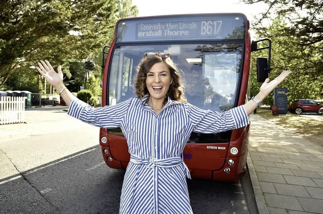 Coun Natalie Oliver and the B617 bus in Woodhall Spa. Photo: LCC