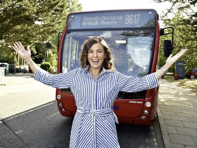 Coun Natalie Oliver and the B617 bus in Woodhall Spa. Photo: LCC