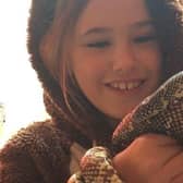 Izzy Robertson with Snakey, pictured together about four years ago.