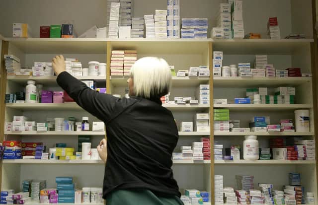 A general view of a pharmacy. Reduced prescription charges were launched by Health and Wellbeing secretary Nicola Sturgeon with pharmacist Mary Cuddihy at Craigton Pharmacy. Charges in Scotland will drop to 5 as part of their phased abolition by the SNP administration.