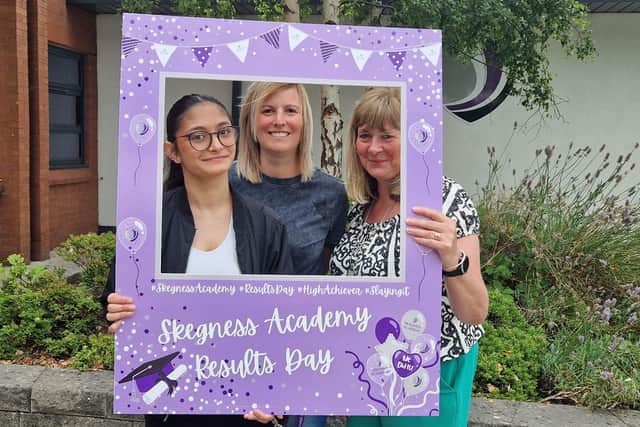 Sophie Good-Beardsley, the second top student, celebrating with Deputy Principal Charlotte Dunn and Jackie Hunt, Deputy Head of Sixth Form.