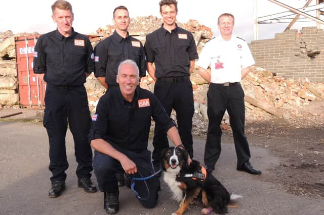 Back home from Turkey, from left - rescue firefighters Colin Calam, Ashley Hildred, Mark Dungworth, Neil Woodmansey and Colin (front), with Chief Fire Officer Mark Baxter.