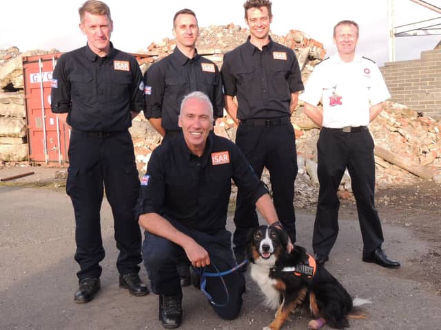 Back home from Turkey, from left - rescue firefighters Colin Calam, Ashley Hildred, Mark Dungworth, Neil Woodmansey and Colin (front), with Chief Fire Officer Mark Baxter.