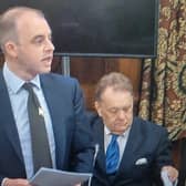 Boston and Skegness MP Matt Warman (left) addressing Westminster Hall on pylons, with Sir John Hayes (South Holland) seated.
