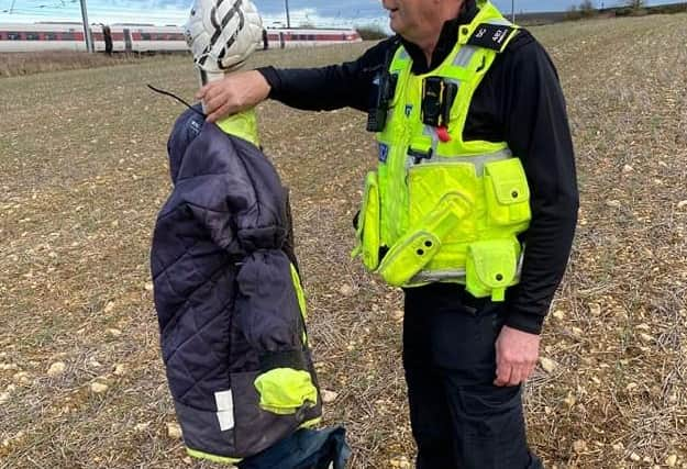 SC Abbott with the scarecrow.