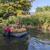 A raft of improvements - staff from works contractor, Lions working on the bankside in the Slea.