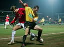 New Sleaford signing Shaun Harrad tussles with Manchester United's Gerard Pique during an FA Cup tie in 2006.
