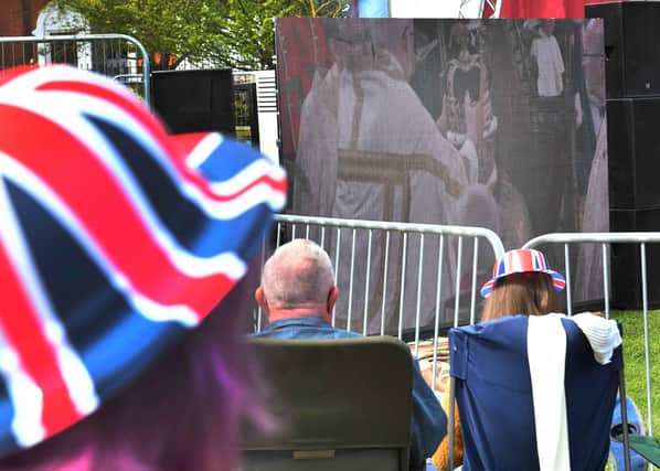 King Charles 111 is crowned - the historic moment is watched on the big screen in Tower Gardens.