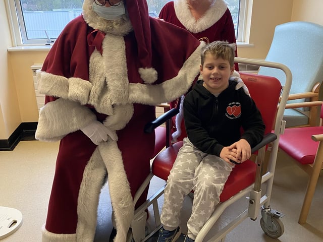 Santa and Mrs Christmas had to mask up for some patients too.
