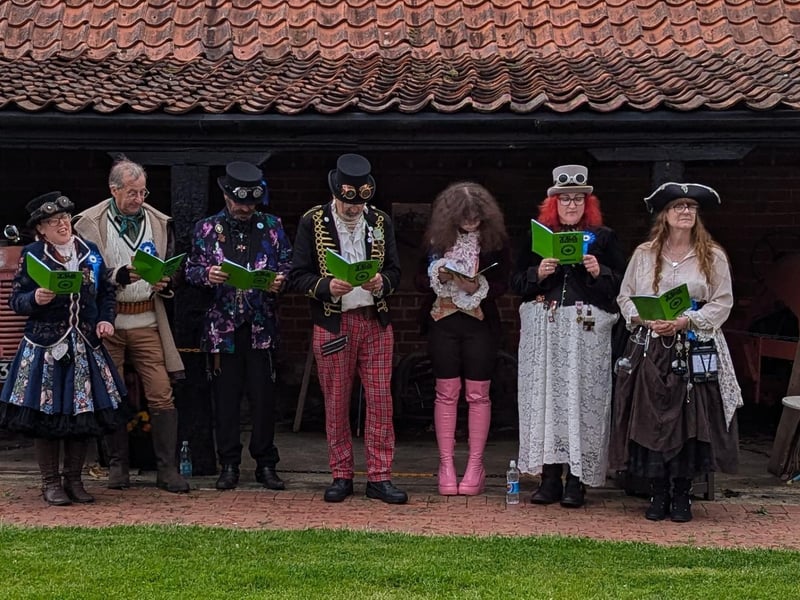 Performers kept singing in the rain but didn't let it dampen their spirits.