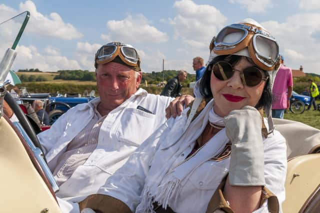 Mr and Mrs Longman fashionably attired sat in their 1934 MGPA.