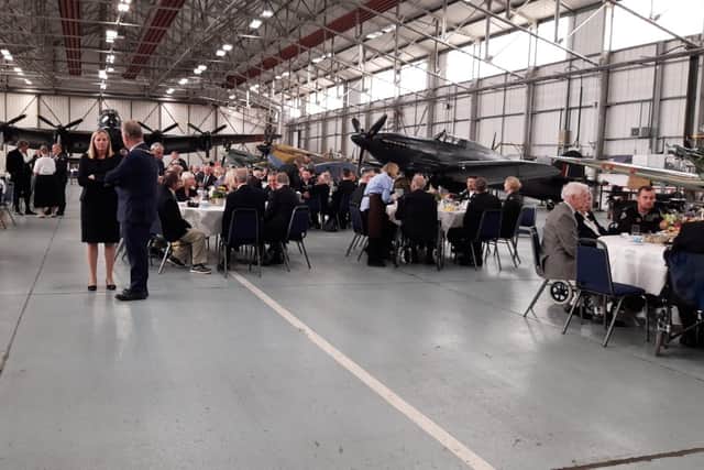 The King will join veterans who are enjoying a tea party in one of the hangars.