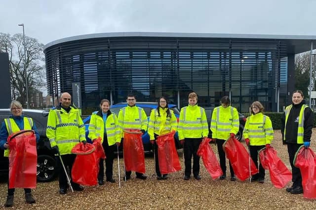 Volunteer litter-pickers at the Boston College site.