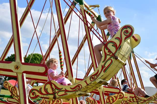 Ameilia Sacker 3 and Eleanor Sacker 9 of Hibaldstow enjoy the fair.