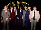 Fashion show models (from left) Kieran Brown, 15, Fletcher Newton, 15, Thomas Maynard, 15, Carlos Cardoso, 15, Joseph Wright, 15, Charlie Lowe, 15, and Breno Silva, 16.