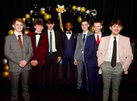 Fashion show models (from left) Kieran Brown, 15, Fletcher Newton, 15, Thomas Maynard, 15, Carlos Cardoso, 15, Joseph Wright, 15, Charlie Lowe, 15, and Breno Silva, 16.