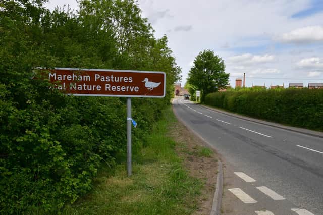 The remnants of a police cordon tape which blocked off Mareham Lane after the incident in Sleaford on Sunday.