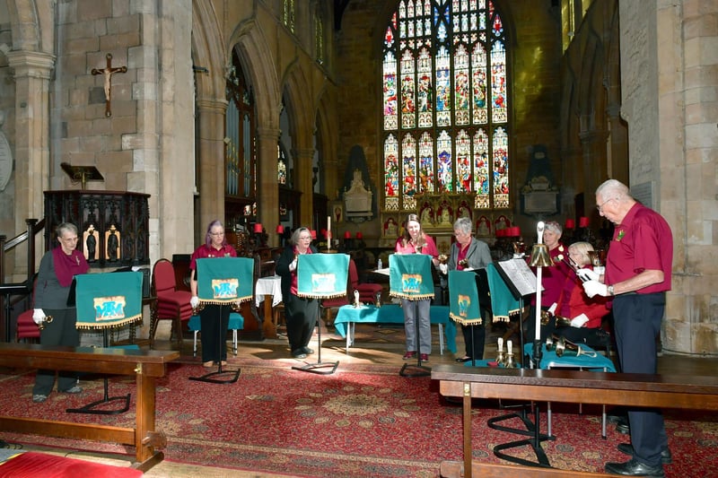 The Music Makers Handbell Ringers performing in St Andrew's Church. Photos: David Dawson