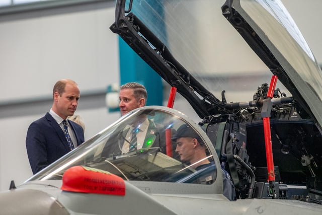 HRH The Prince of Wales meets BAE Systems personnel and examining a Typhoon.