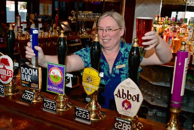 Red Lion manager, Abbey Gibb, ready to serve you.