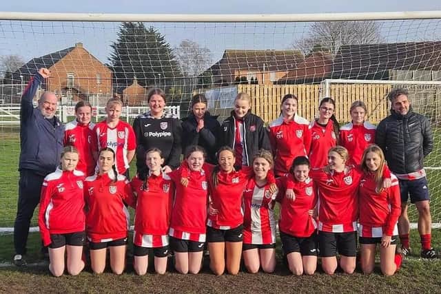 Horncastle Town Girls U16s are pictured with their coaches having won their league at the weekend.