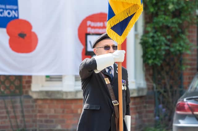 Brian Harvey, Sleaford RBL standard bearer, commemorating the 75th anniversary of VE Day in 2020. Photo: John Aron
