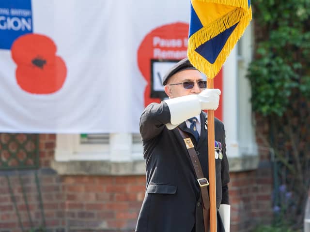 Brian Harvey, Sleaford RBL standard bearer, commemorating the 75th anniversary of VE Day in 2020. Photo: John Aron