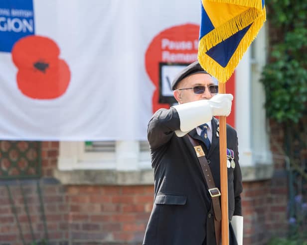 Brian Harvey, Sleaford RBL standard bearer, commemorating the 75th anniversary of VE Day in 2020. Photo: John Aron