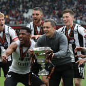 Grimsby beat the odds to win promotion to League Two.