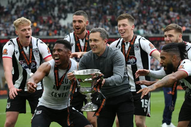 Grimsby beat the odds to win promotion to League Two.