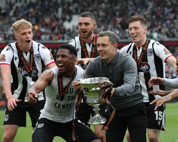 Grimsby beat the odds to win promotion to League Two.