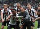 Grimsby beat the odds to win promotion to League Two.