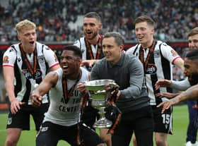 Grimsby beat the odds to win promotion to League Two.