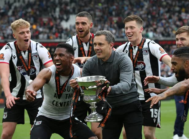Grimsby beat the odds to win promotion to League Two.
