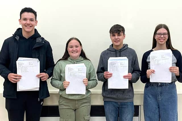 Andrew Lucas, Aimee Laud, Kieran Draper, and Ola Gdula collecting their results at Thomas Cowley High School, Donington.