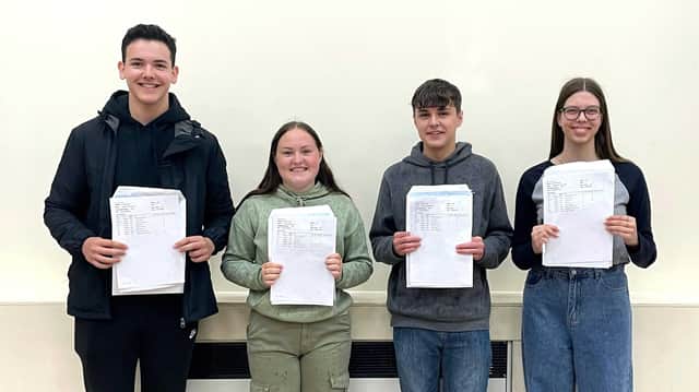 Andrew Lucas, Aimee Laud, Kieran Draper, and Ola Gdula collecting their results at Thomas Cowley High School, Donington.