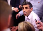 Prime Minister Rishi Sunak holds a "huddle" press conference with political journalists on board a Government plane as he heads to Bali, in Indonesia to attend the G20 summit. Picture date: Sunday November 13, 2022.