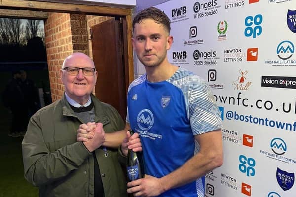Richard Crunkhorn presents Jordan Nuttell with his  man of the match award on behalf of Rose Farm Logs